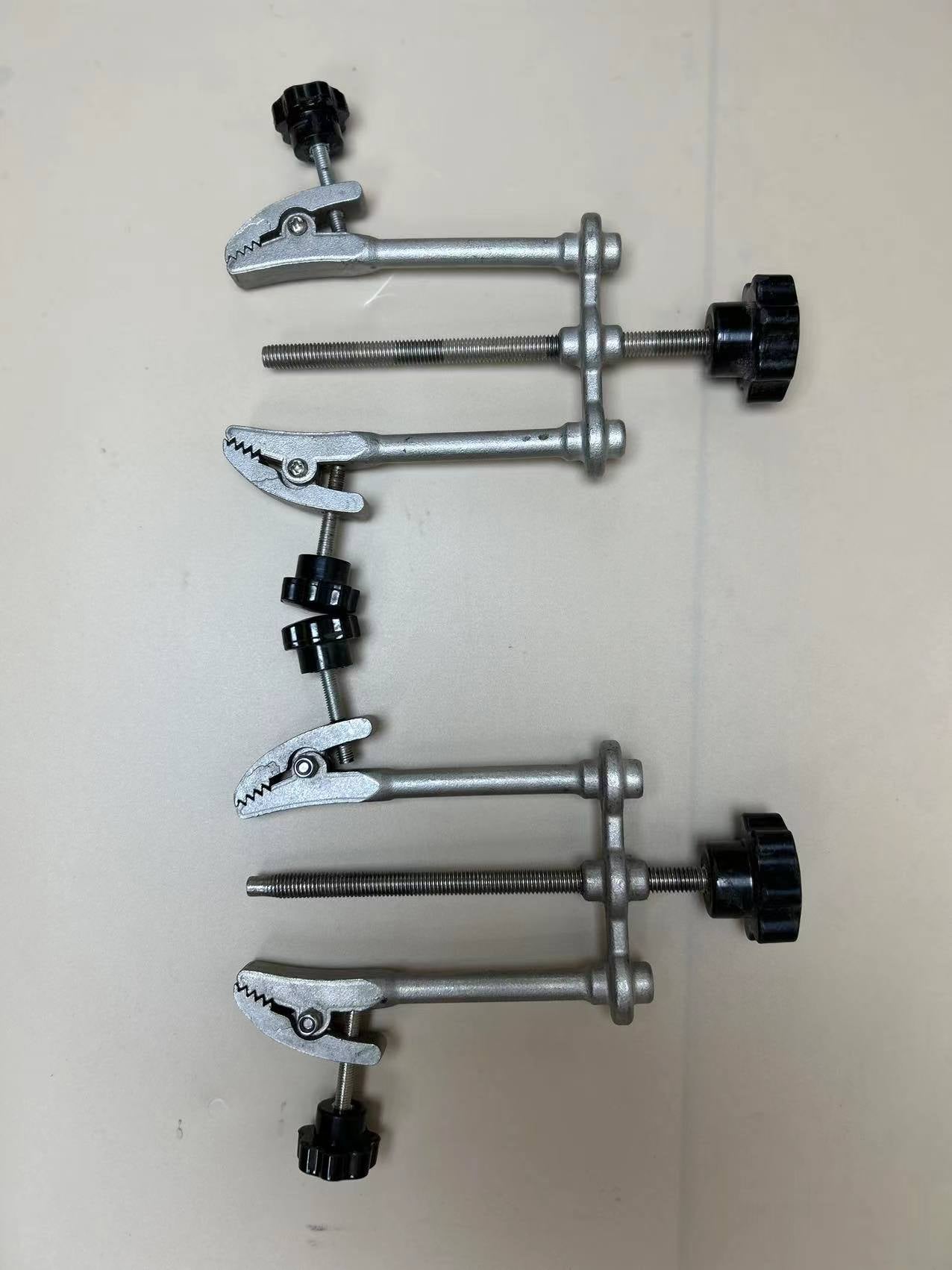 Adjustable clamp for upper crimping