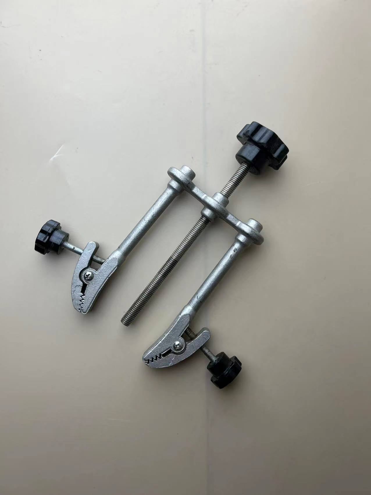 Adjustable clamp for upper crimping