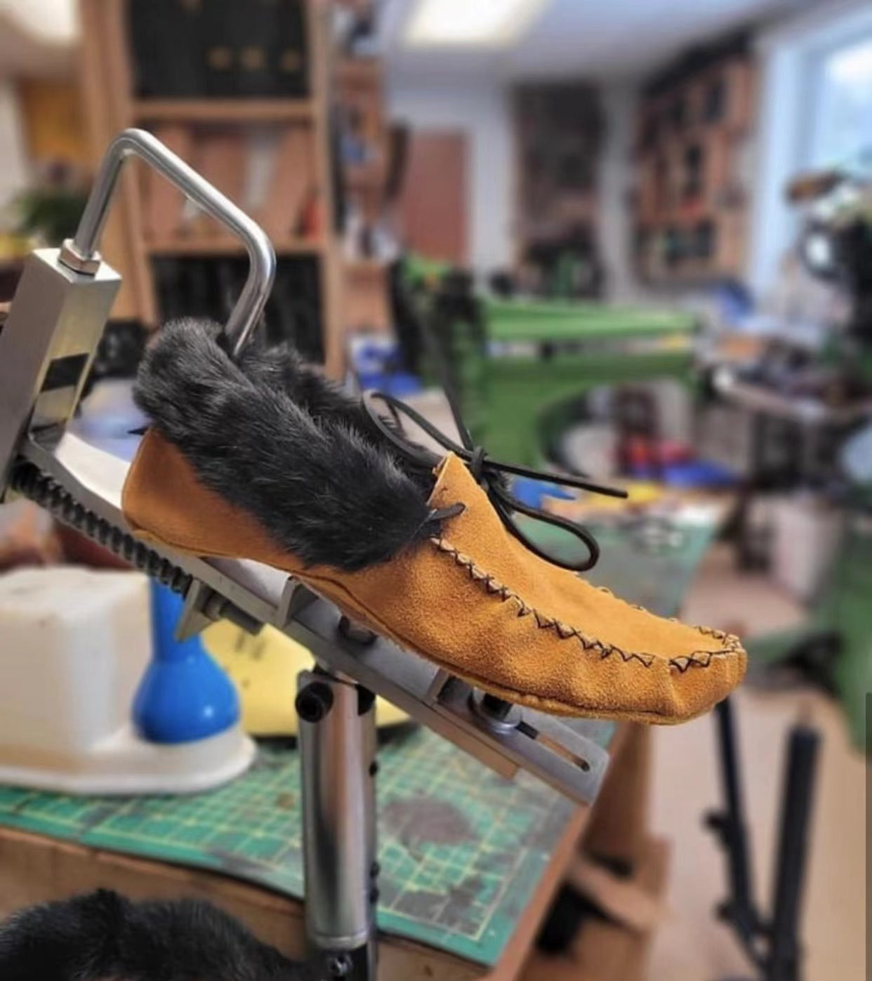 Moccasin shoes stand tools