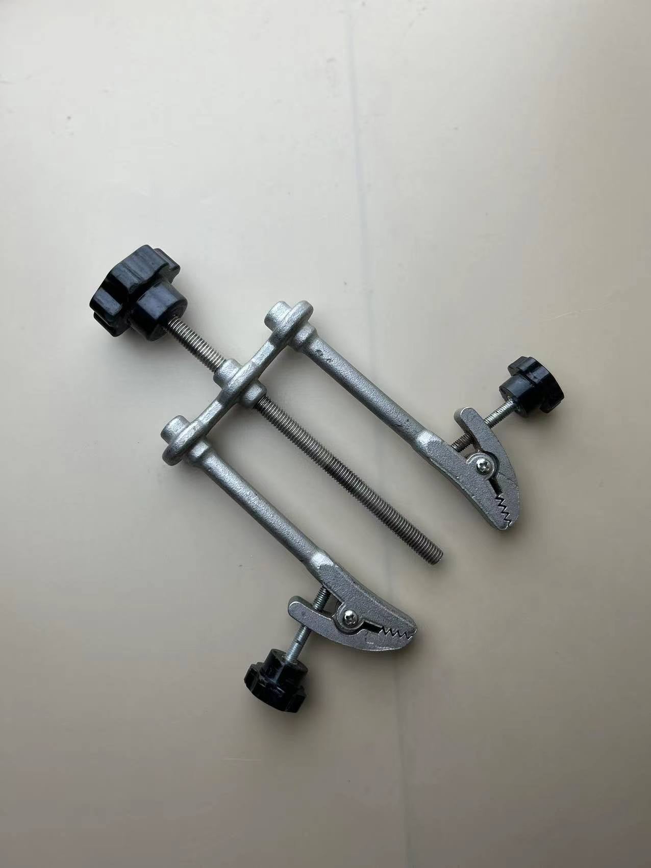 Adjustable clamp for upper crimping